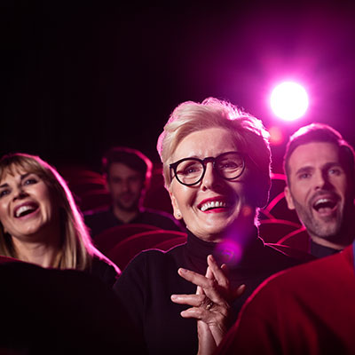 Middle age woman at the theatre